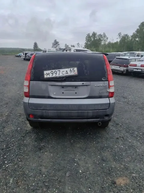 Автомобиль марки “Хонда Н- RV” государственный номер М 997 СА 65.