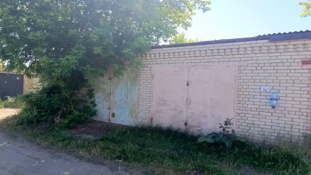 Гараж с земельным участком