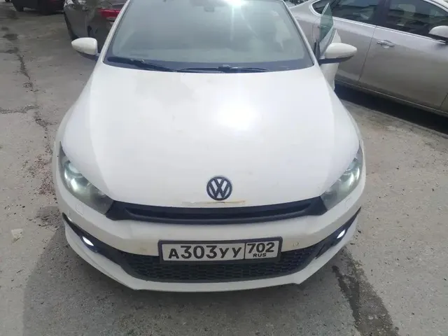 Автомобиль Volkswagen Scirocco, 2012 г.в., г/н А303УУ702, идентификационный номер (VINWVWZZZ13ZCV040582),
