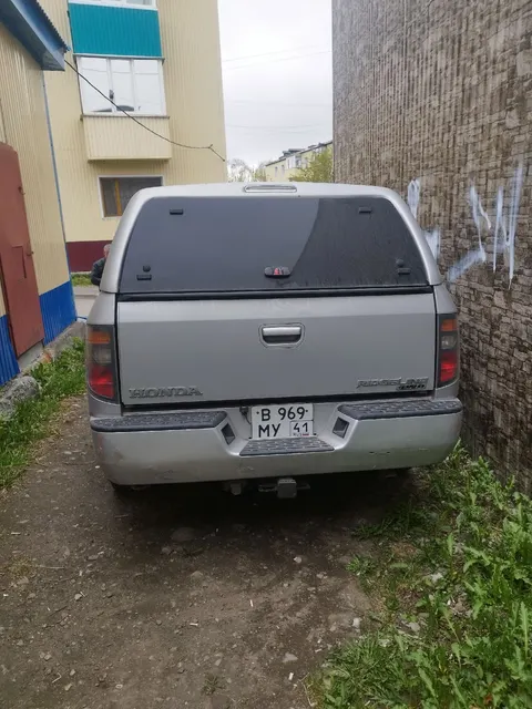 Автомобиль Honda Ridgeline, 2006 года выпуска, цвет - серый, государственный номер В969МУ41, идентификационный номер (VIN) 2HJYK16487H512426.