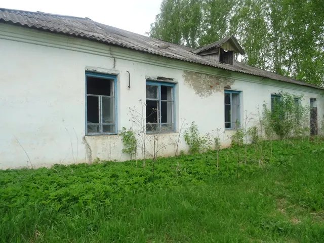 Нежилое здание (1963 года, кирпичное, одноэтажное, площадью 163,1 кв.м,  кадастровый номер 72:06:0101005:67) с земельным участком (площадью 4054 кв.м, кадастровый номер 72:06:0101005:169)тю