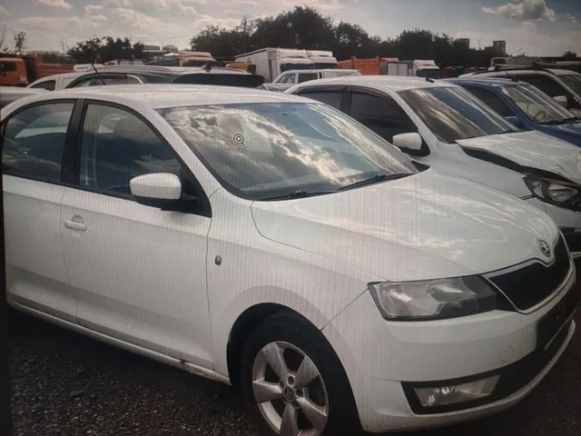 Легковой автомобиль Skoda Rapid, 2014 г.в., г/н Е203РХ161, VIN XW8AD4NH7FK103755, белого цвета, на бампере сколы, потертости с правой и левой стороны, сколы краски, на правом пороге спереди нарушение ЛКП, вмятина, на лобовом стекле трещина, салон в удовлетворительном состоянии, в залоге, должник Колесова М.Б., (Поручение ТУ Росимущества в РО от 28.09.2026 № 61-1751-У). Адрес (местоположение): Ростовская область, г. Аксай, ул. Западная, д. 2Д.