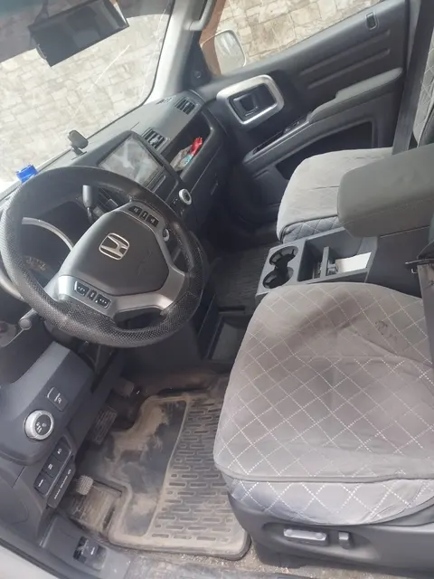 Автомобиль Honda Ridgeline, 2006 года выпуска, цвет - серый, государственный номер В969МУ41, идентификационный номер (VIN) 2HJYK16487H512426.