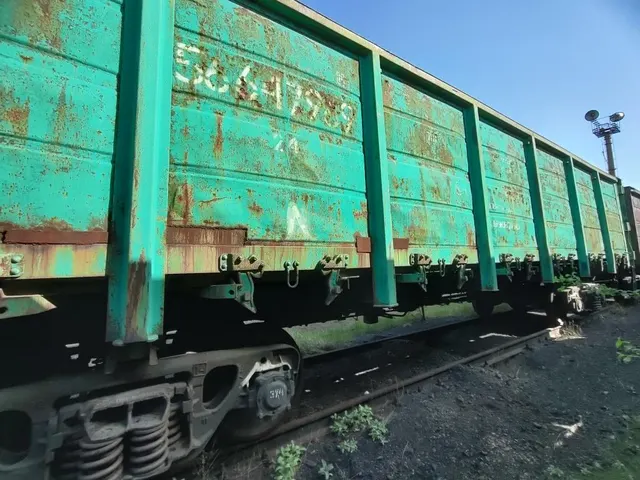 Полувагон 4-осный с люками в полу без тормозной площадки